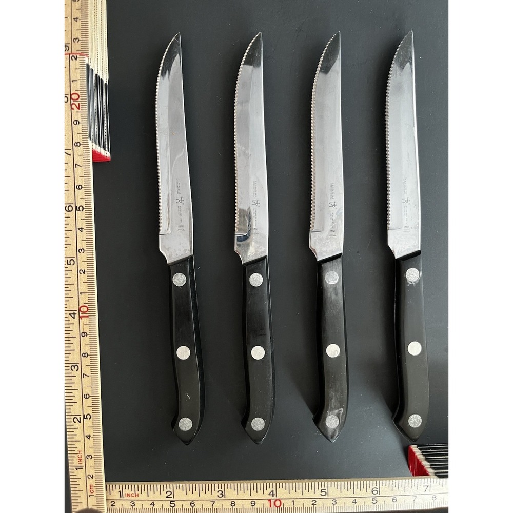 J.A. Henckels International Stainless Steel Serrated Knife Set 4 Black Handles